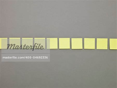 Yellow Adhesive Notes in a row