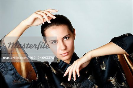 Young attractive girl poses during a photo session