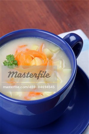 Delicious homemade potato soup with carrot