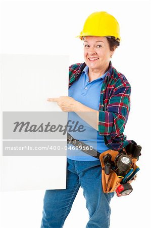 Female construction worker holding and pointing to a blank sign, ready for your text.