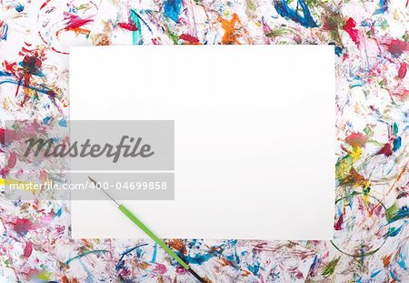 Colorful abstract watercolor background splash with a blank paper