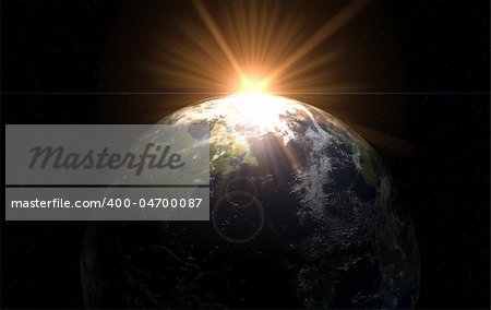 Sunrise over globe in space