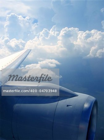 airplane reactor sky view from aircraft  clouds