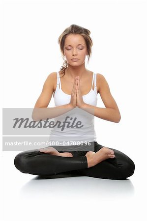 Beautiful young woman doing yoga exercise isolated