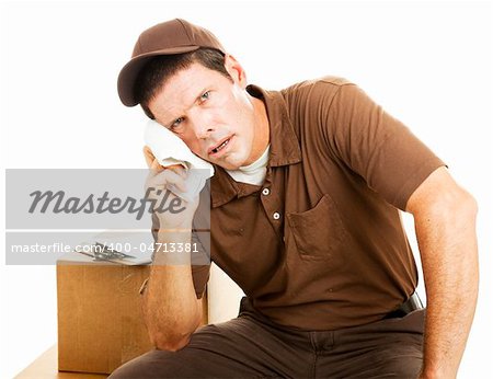 Exhausted delivery guy takes a break.  Isolated on white.