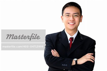 Young good looking asian business man on a white background isolated