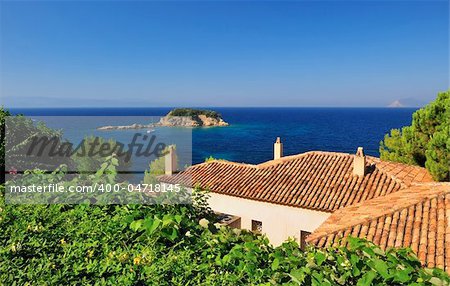 Greek village rooftops with spectacular view of the Aegean Sea