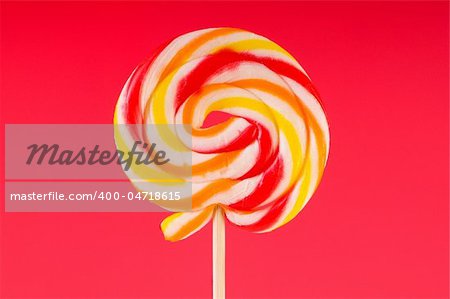 Colourful lollipop against the colourful background