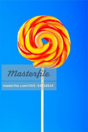 Colourful lollipop against the colourful background