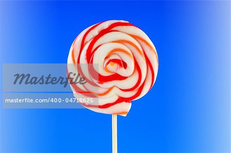 Colourful lollipop against the colourful background