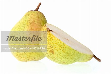 Whole and half pear on white background.