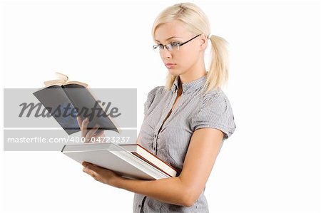 young and beautiful teacher with glasses reading a book