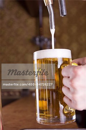 Glass of beer on pub