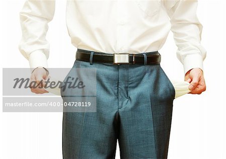 Homme d'affaires avec les poches vides sur fond blanc