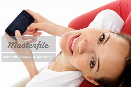 young woman with smart phone on white background studio