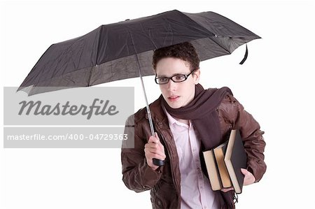 Young boy with an umbrella carrying books, isolated on white, studio shot
