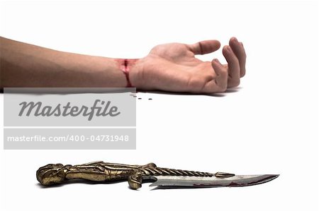 A bloody knife and a cut wrist, isolated on white. This image has innumerous uses like accidents, domestic violence, suicide, murder, hate, etc...
