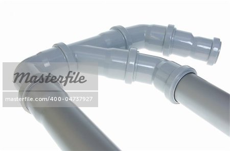 Gray plastic sewer pipes isolated on the white
