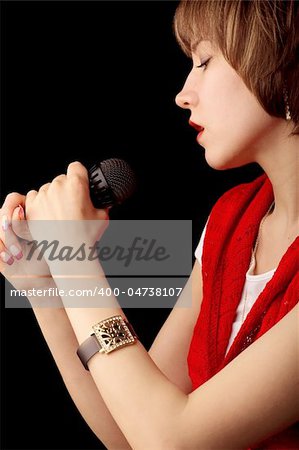 Image of a young singer with microphone