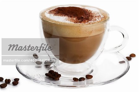 cappuccino with cocoa powder and coffee beans in a glass cup on white background
