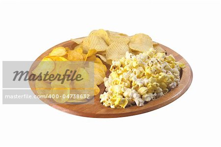 pop corn and potato chips on plate isolated on white background