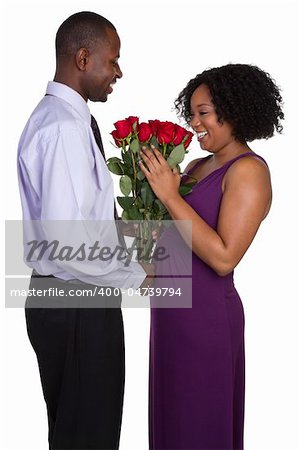 Romantic black couple holding roses