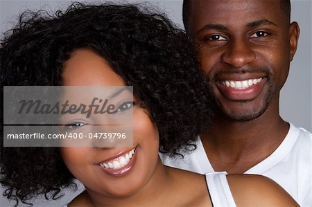 Smiling happy african american couple