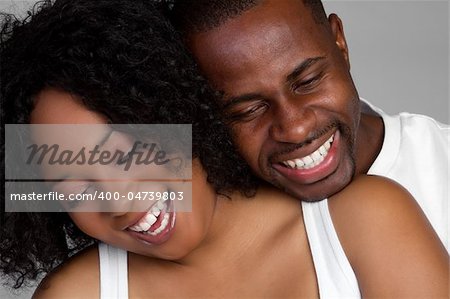Happy laughing black couple