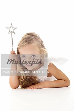 Little angel fairy with magic wand smiling - isolated