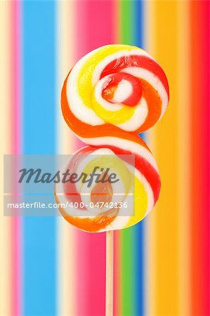 Colourful lollipop against the colourful background