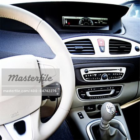 Man driving a car. Inside view.