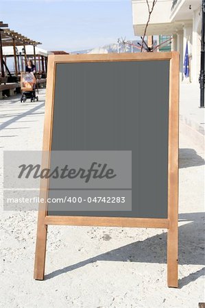 Restaurant menu chalkboard on the street