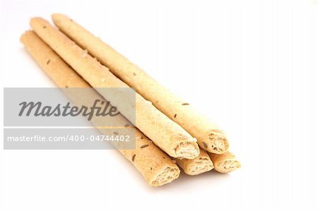 Salted bread sticks on white background