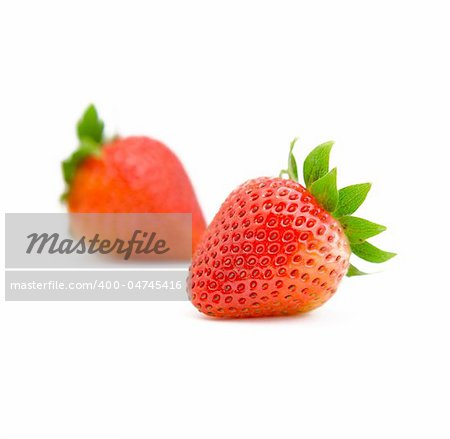 two strawberries on white background