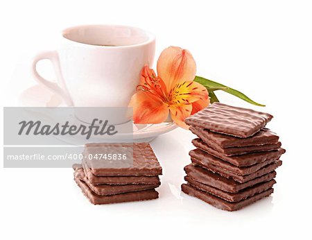 Cup of coffee and cookies isolated on white