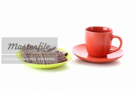 Chocolate cookie and cup of coffee isolated on white