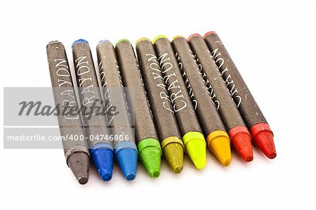 Different color crayons isolated on white