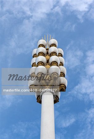Lamp post on background sky, golden candelabrums
