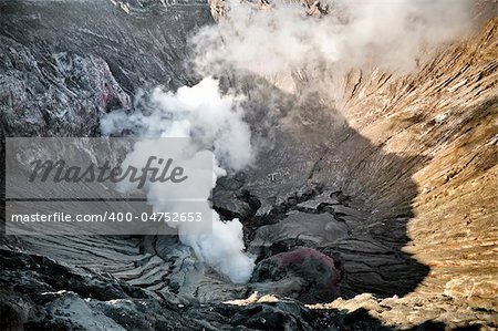 Smoking crater detail in Indonesian volcano Bromo