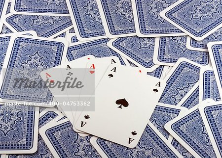 Four Aces in  Background scattered Playing Card Back  .