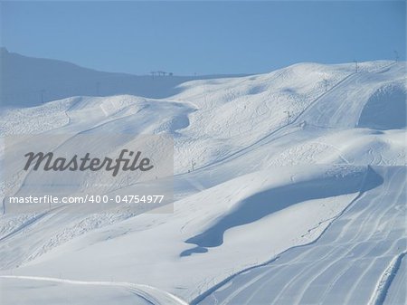 Extensive ski piste and powder snow off piste. Skiing Les Contamines, Franch alps