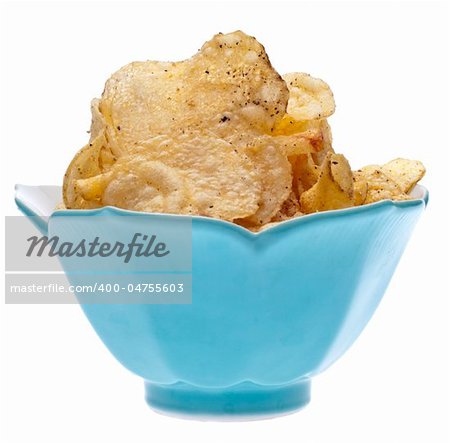 Salt and Pepper Potato Chips in a Blue Bowl Isolated on White.