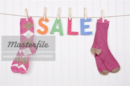 Vibrant Image for Your Next SALE featuring the word SALE and Pink Socks.