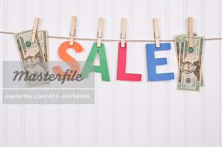 Vibrant Image for Your Next SALE featuring the word SALE and American Currency.