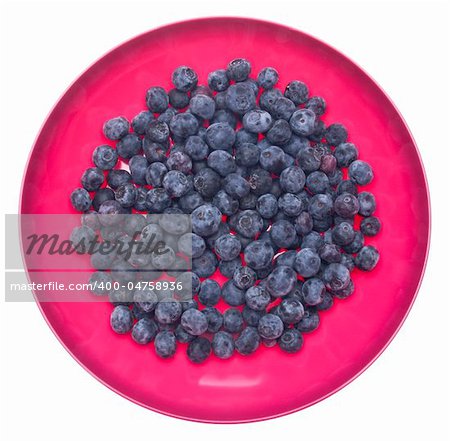 Fresh Blueberries in a Vibrant Pink Bowl Isolated on White with a Clipping Path.