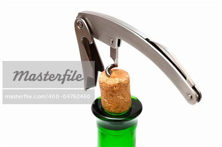 Corkscrew, cork and bottle on a white background