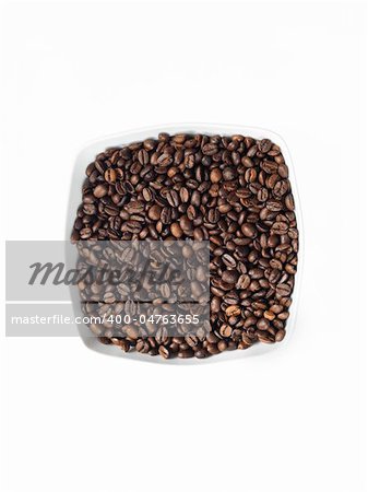 dish full of coffee beans on the white background