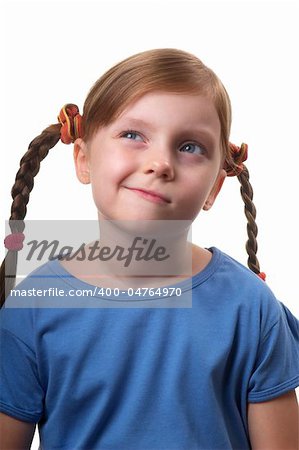 Thinking funny smiling little girl portrait isolated over white background