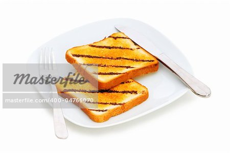 Freshly toasted bread in the white plate