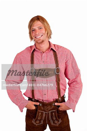 Happy casual Bavarian man with oktoberfest leather trousers (lederhose) . Isolated on white background.